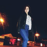 Оля Титова